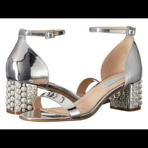 New- worn once Betesh Johnson Silver Heels!